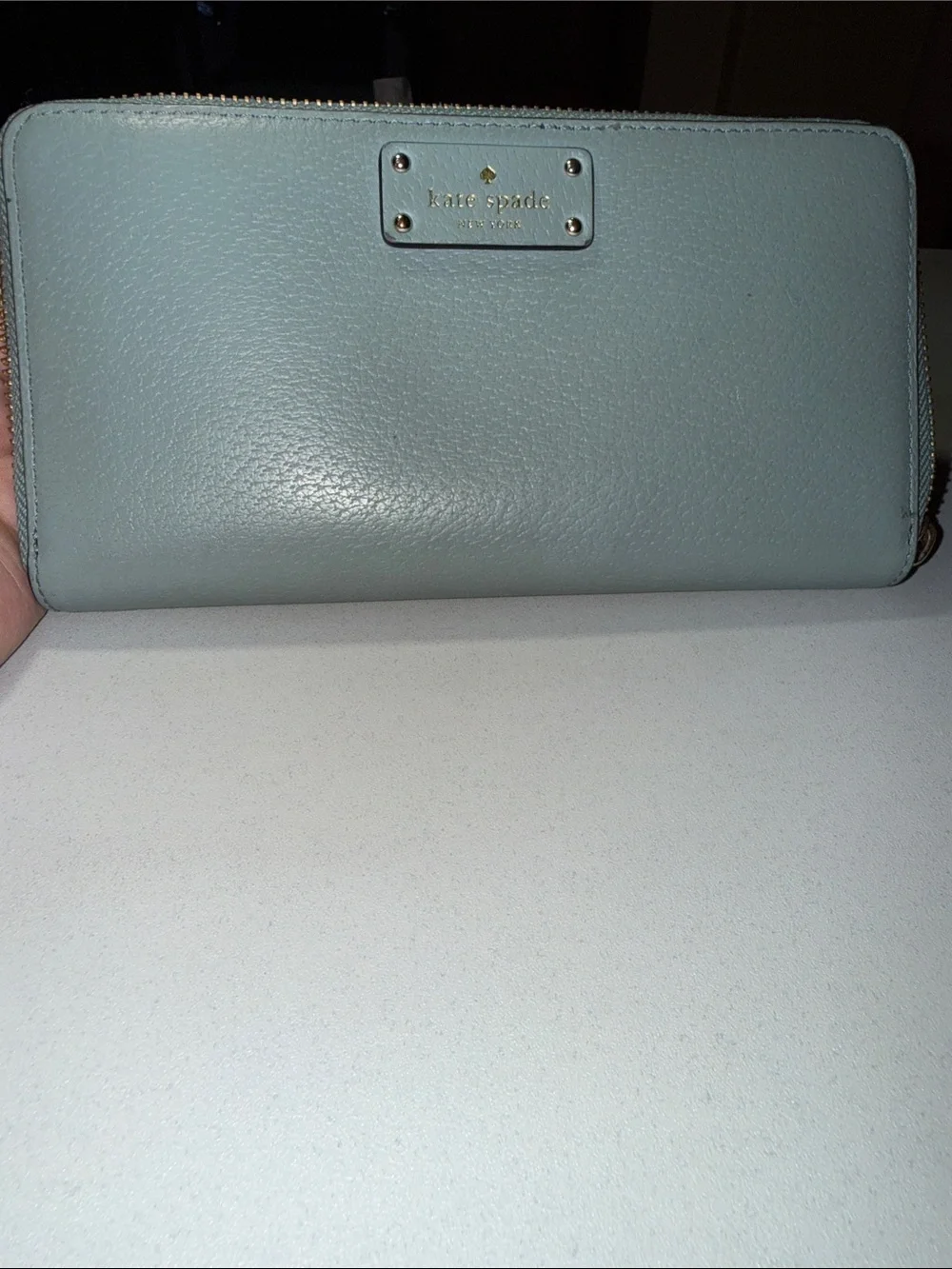 kate spade light blue pebbled gold tone zip-around wallet